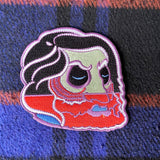 The Severed Head of Magog Iron On Patch Purple